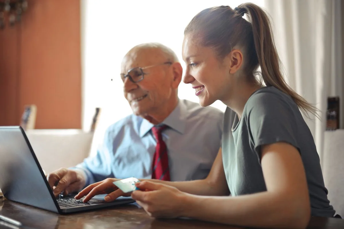 Friendly home care consultation at the kitchen table